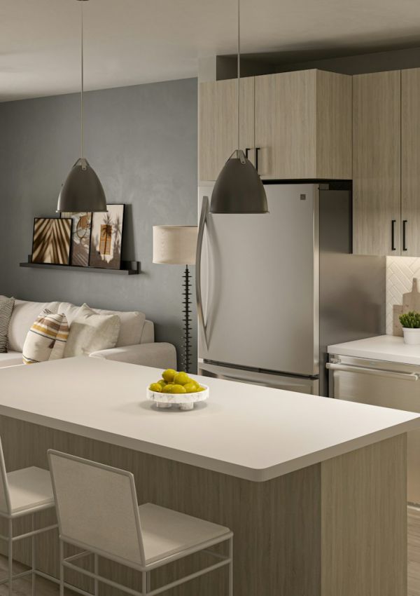 a kitchen with a large white island next to a sliding glass door