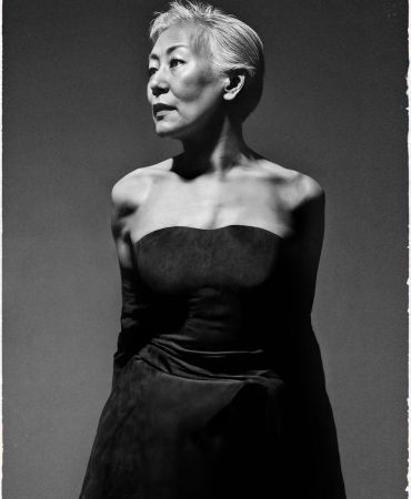 Ai generated image of a short haired model looking off camera