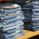 pile of blue denim jeans lot