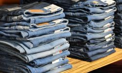pile of blue denim jeans lot